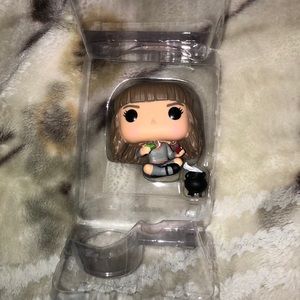 Hermione granger figurine with unattached cauldron.